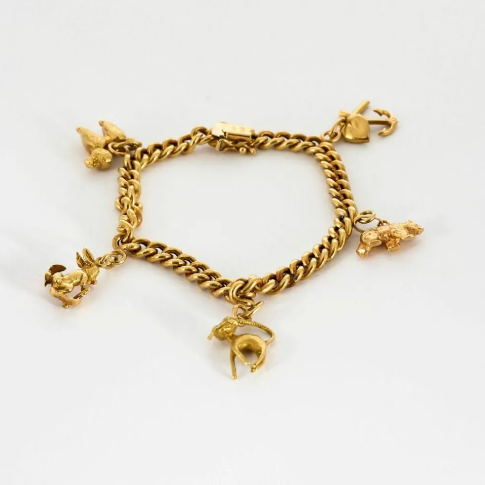 Bracelet souple or jaune et charms