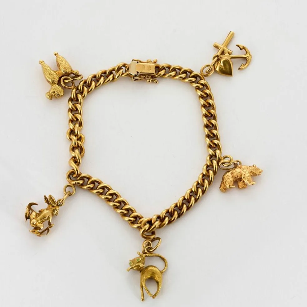 Bracelet souple or jaune et charms