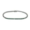 Bracelet tennis en or blanc avec pierres semi-précieuses vertes et diamants