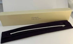 Bracelet tennis ligne en or gris serti de 60 diamants