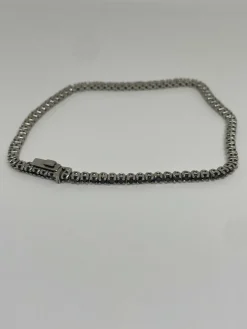 Bracelet tennis or blanc et diamants noirs