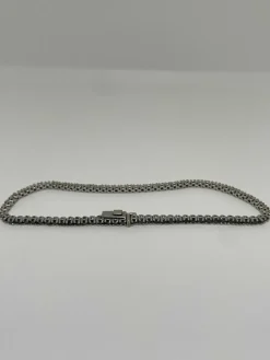 Bracelet tennis or blanc et diamants noirs