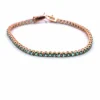 BRACELET UNISEXE « TENNIS » - OR ROSE 18 KT - ÉMERAUDES NATURELLES