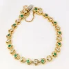 Bracelet vintage or jaune, diamants et émeraudes