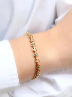 Bracelet vintage or jaune, diamants et émeraudes