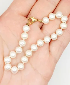 Bracelet vintage or jaune orné de perles de cultures