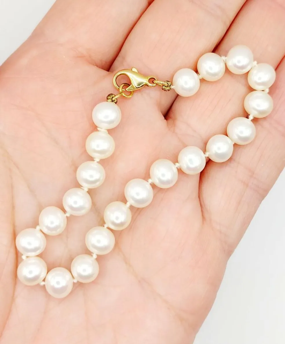Bracelet vintage or jaune orné de perles de cultures