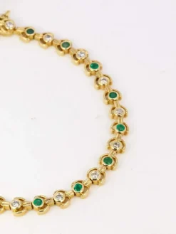Bracelet vintage or jaune, diamants et émeraudes