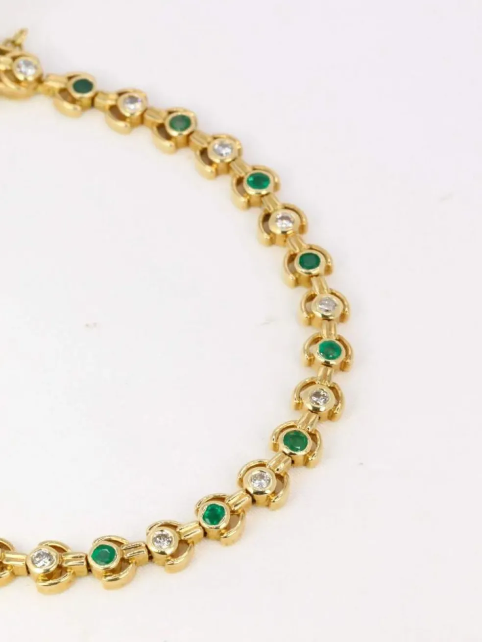 Bracelet vintage or jaune, diamants et émeraudes