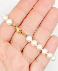 Bracelet vintage or jaune orné de perles de cultures