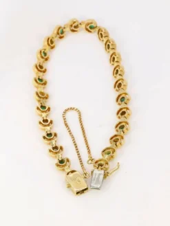 Bracelet vintage or jaune, diamants et émeraudes