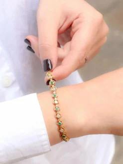 Bracelet vintage or jaune, diamants et émeraudes