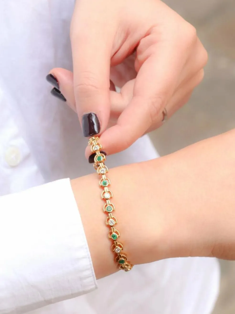 Bracelet vintage or jaune, diamants et émeraudes