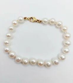 Bracelet vintage or jaune orné de perles de cultures