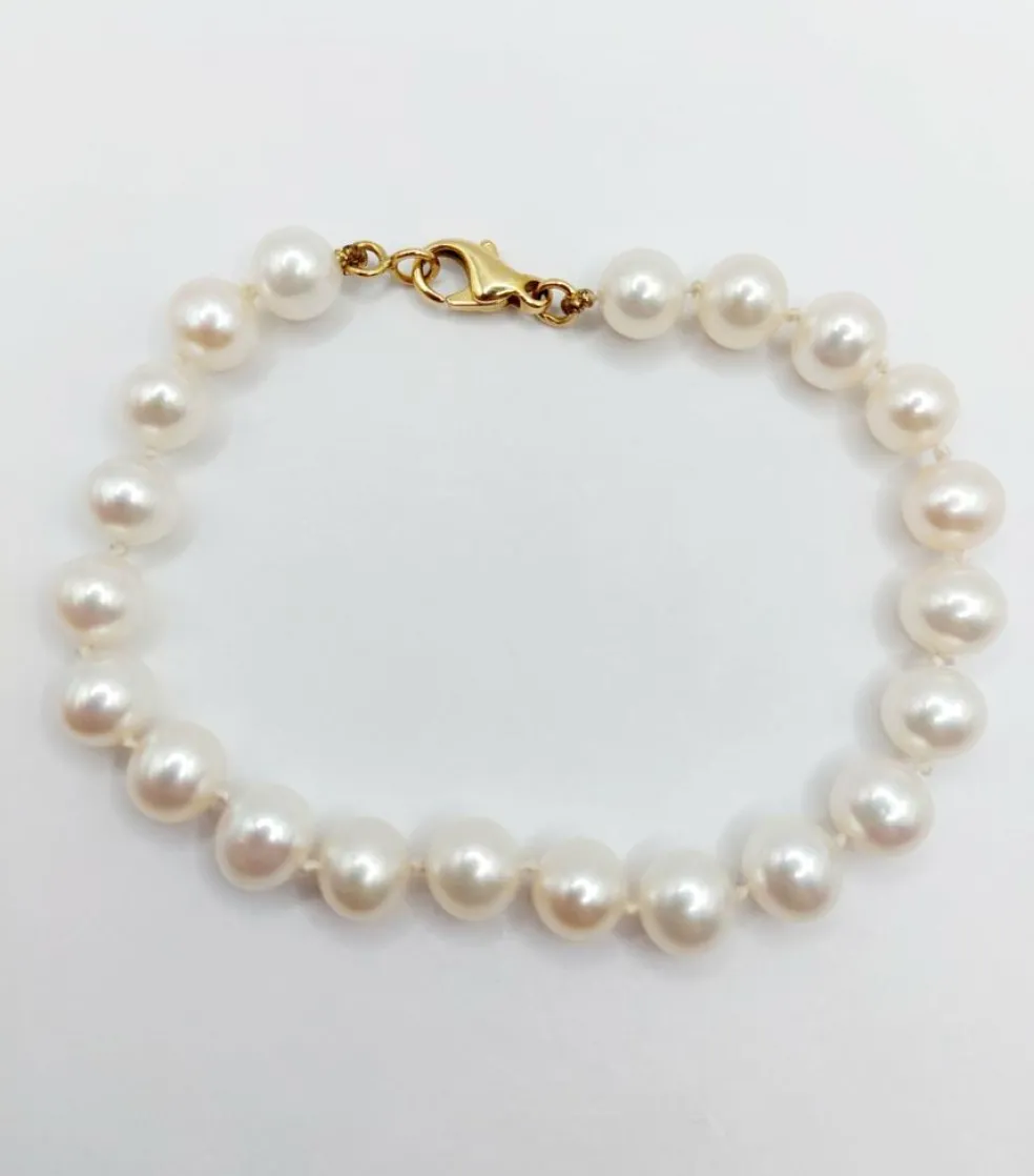 Bracelet vintage or jaune orné de perles de cultures