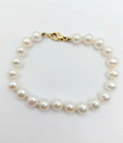 Bracelet vintage or jaune orné de perles de cultures