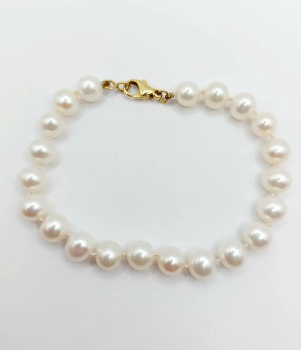 Bracelet vintage or jaune orné de perles de cultures