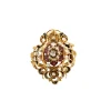 Broche à décor de rinceau et fleurs avec émail noir, perles et grenats