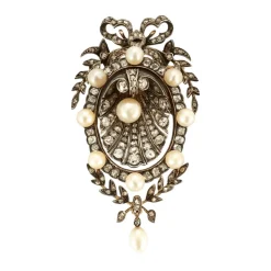 Broche à motif floral et noeud ornée de perles et diamants