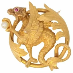 Broche ancienne chimère à la perle