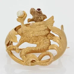 Broche ancienne chimère à la perle