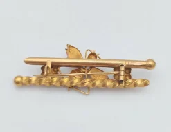 Broche animalière ancienne or jaune diamant