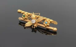 Broche animalière ancienne or jaune diamant