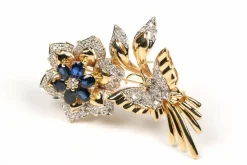 Broche Années 70 en or jaune sertie de saphirs et de diamants