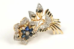 Broche Années 70 en or jaune sertie de saphirs et de diamants