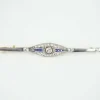 Broche art déco diamants saphirs 2 ors