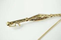 Broche art déco diamants saphirs 2 ors