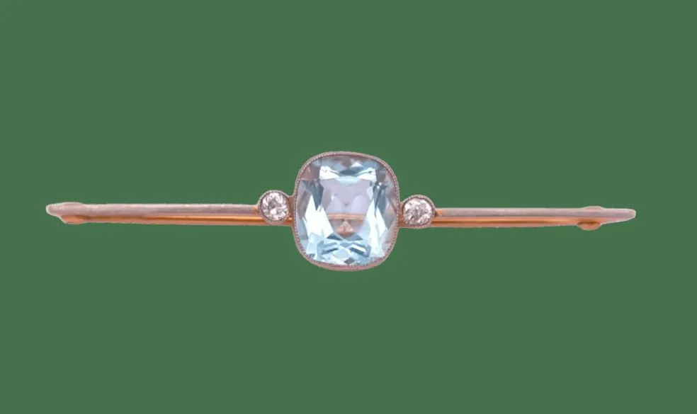 Broche Art Déco en or ornée d'une belle aigue marine et de diamants