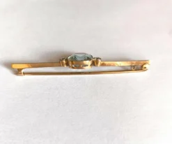 Broche Art Déco en or ornée d'une belle aigue marine et de diamants