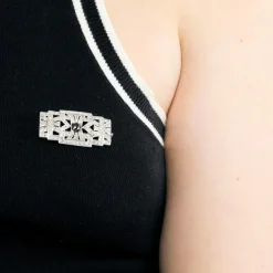 Broche art déco en platine, diamants et saphir