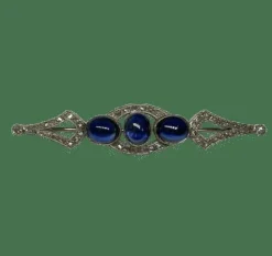 Broche Art Déco or, platine, cabochons saphirs