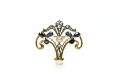 Broche Art Nouveau en or jaune, saphirs, diamants taille rose et perles