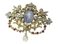 Broche avec deux sphinges diamant, saphir