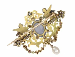 Broche avec deux sphinges diamant, saphir