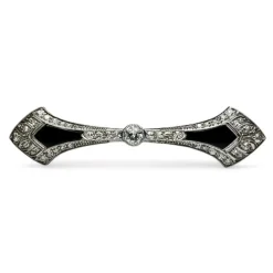 Broche barrette Art-Déco en platine, diamants et onyx.
