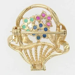 Broche bouquet or jaune saphirs rubis émeraudes