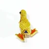Broche Canard or jaune, corail, saphirs