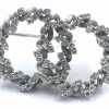 Broche double cercle diamants