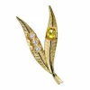 Broche double feuille en or