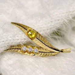 Broche double feuille en or