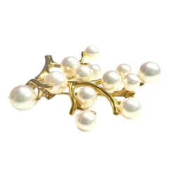 Broche en or avec perles