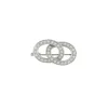 Broche en or blanc avec diamants