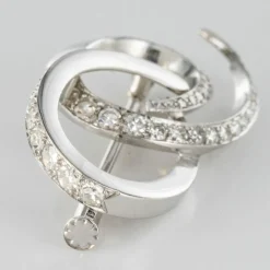 Broche en or blanc et diamants