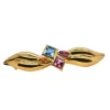 Broche en or jaune 18 carats, ornée de topaze bleue, tourmalines roses et quartz orange