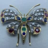 Broche en or jaune argent diamants pierres de couleurs