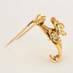 Broche en or jaune et diamants